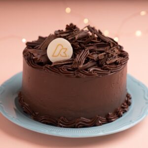 Round chocolate Cake With Angelina Kyria Chocolate Logo